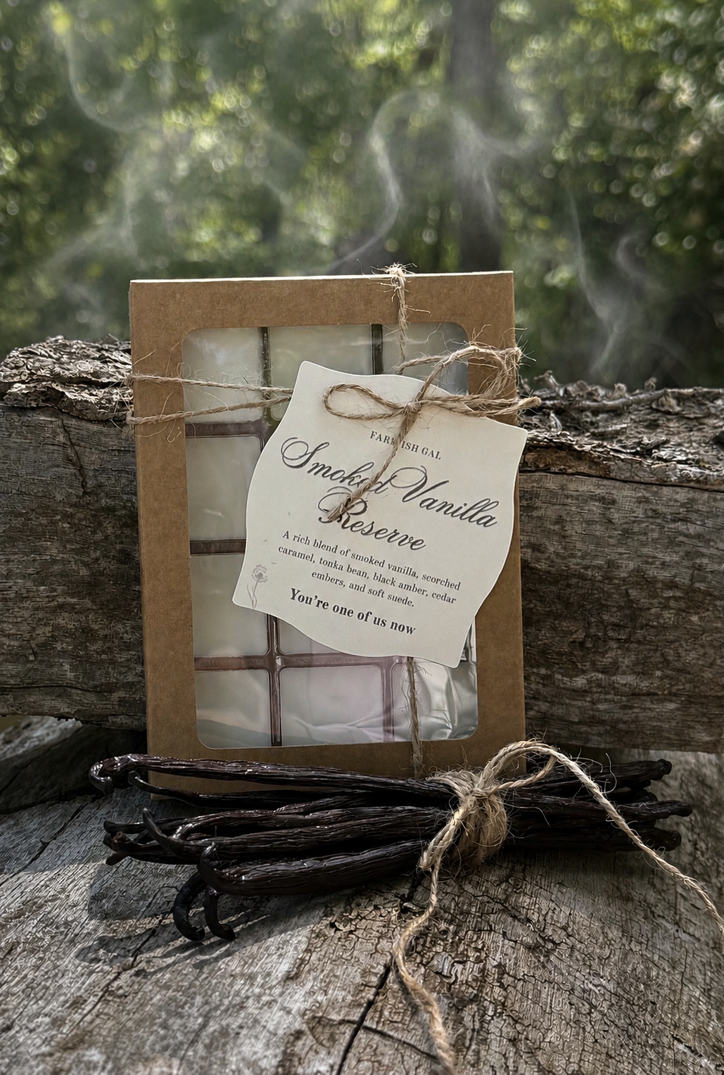 Wax melts in Kraft paper box with window and a tag that says Smoked Vanilla Reserve