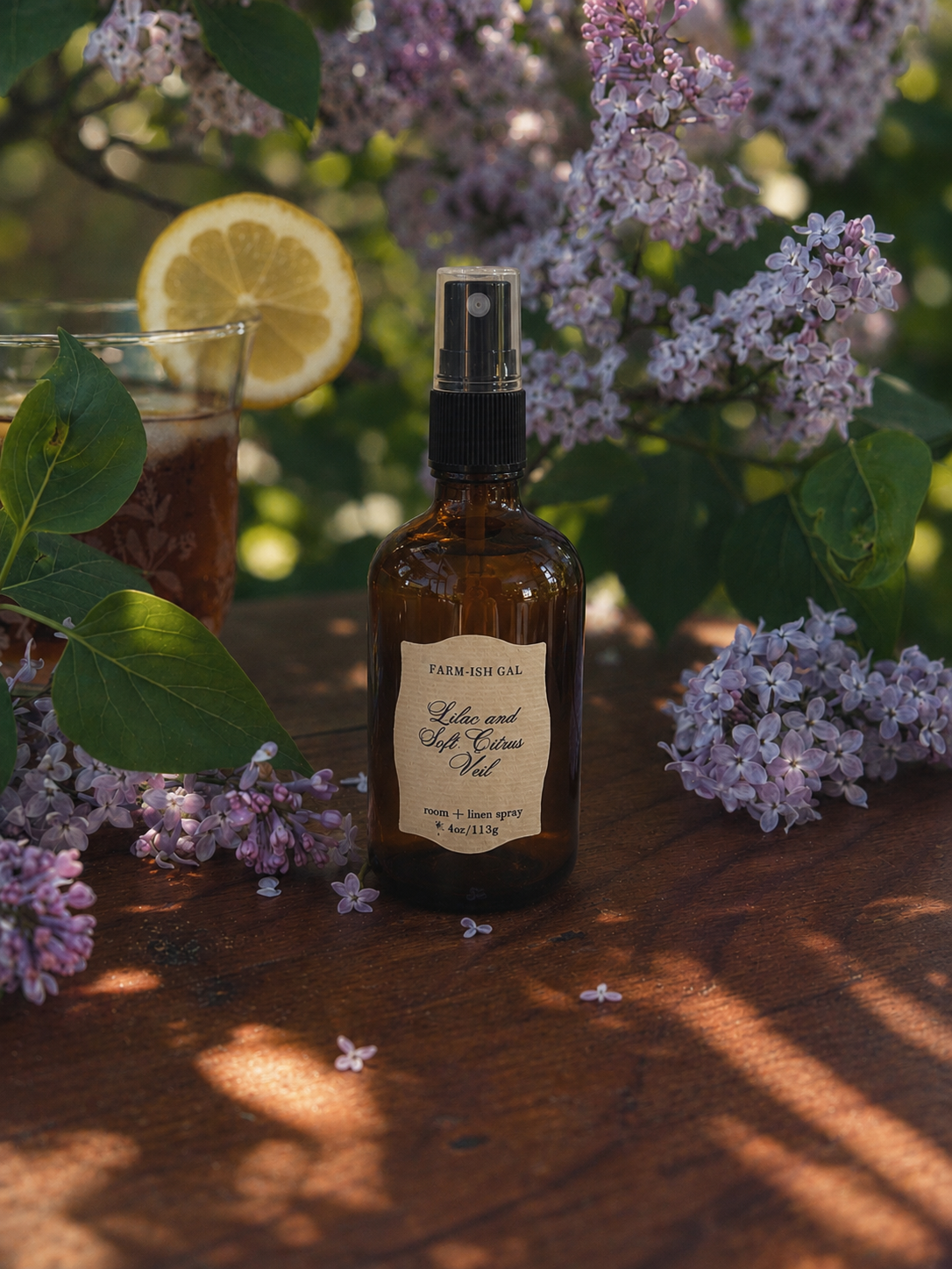 amber glass fine mist spray bottle with label that reads Lilac and Soft Citrus Veil