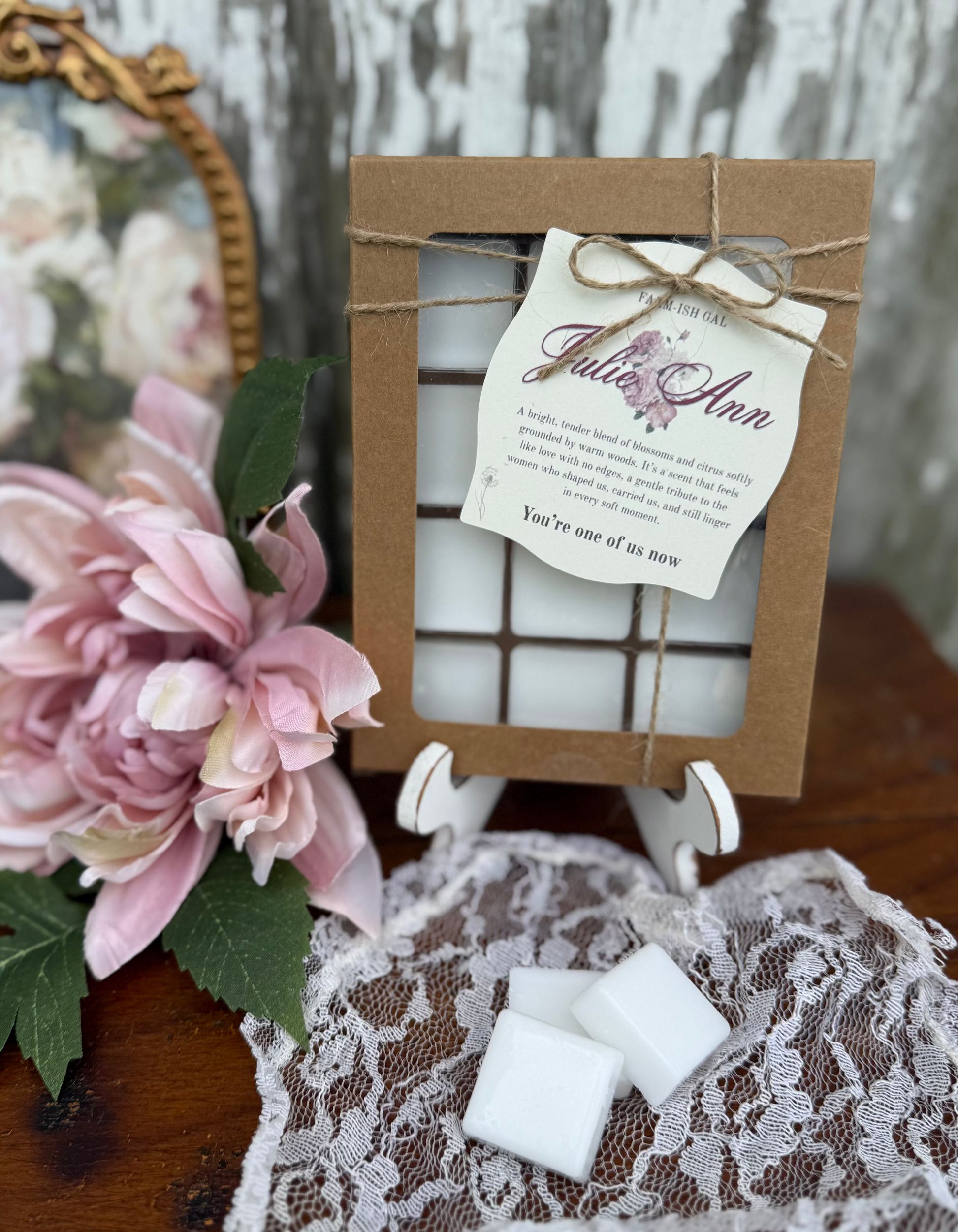Wax melts in a Kraft paper box with a window and a tag that says Julie Ann